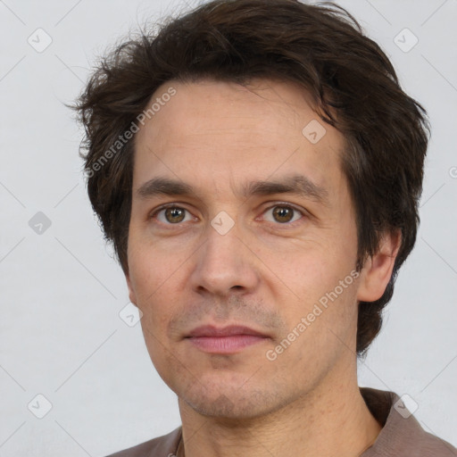 Neutral white adult male with short  brown hair and brown eyes