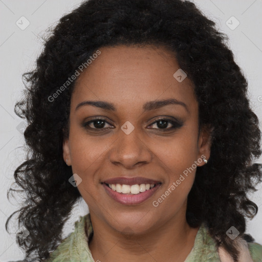 Joyful black young-adult female with long  brown hair and brown eyes