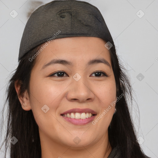 Joyful asian young-adult female with long  brown hair and brown eyes