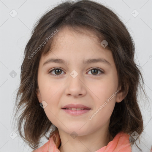 Joyful white child female with medium  brown hair and brown eyes