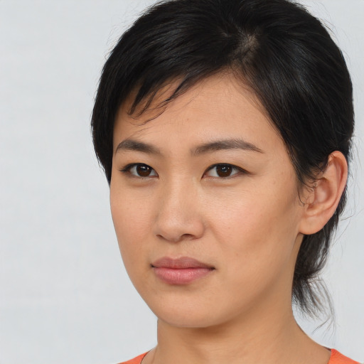 Neutral asian young-adult female with medium  black hair and brown eyes