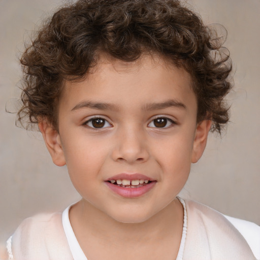 Joyful white child male with short  brown hair and brown eyes