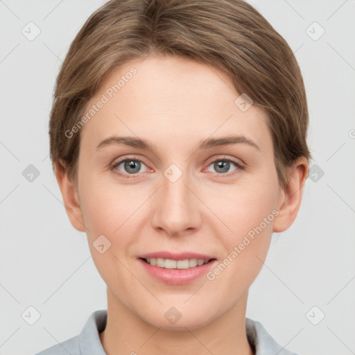 Joyful white young-adult female with short  brown hair and grey eyes