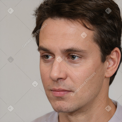 Neutral white adult male with short  brown hair and brown eyes