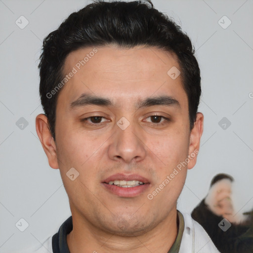 Joyful white young-adult male with short  black hair and brown eyes