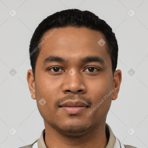 Neutral latino young-adult male with short  black hair and brown eyes