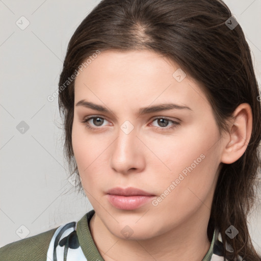 Neutral white young-adult female with medium  brown hair and brown eyes