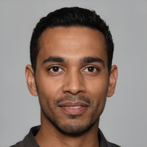 Neutral latino young-adult male with short  black hair and brown eyes