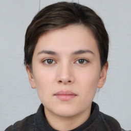 Neutral white young-adult female with short  brown hair and brown eyes