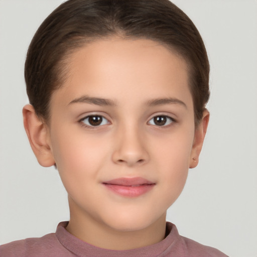 Joyful white child female with short  brown hair and brown eyes