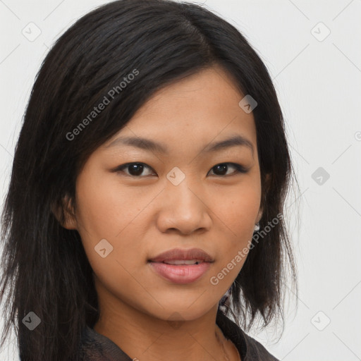 Joyful asian young-adult female with long  brown hair and brown eyes