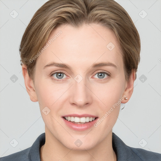 Joyful white young-adult female with short  brown hair and grey eyes