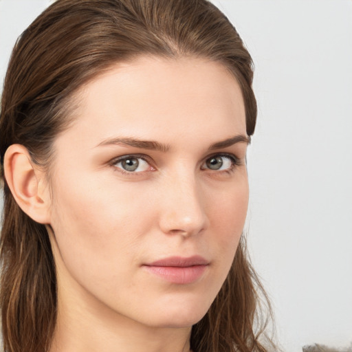 Neutral white young-adult female with long  brown hair and grey eyes