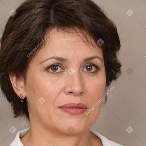 Joyful white adult female with medium  brown hair and brown eyes