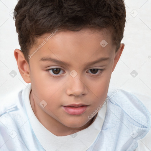 Joyful white child male with short  brown hair and brown eyes