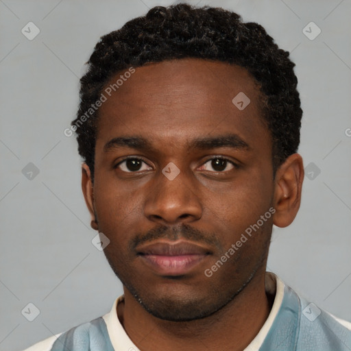 Neutral latino young-adult male with short  brown hair and brown eyes