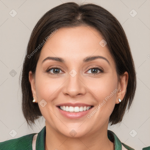 Joyful white young-adult female with medium  brown hair and brown eyes