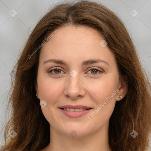 Joyful white young-adult female with long  brown hair and green eyes