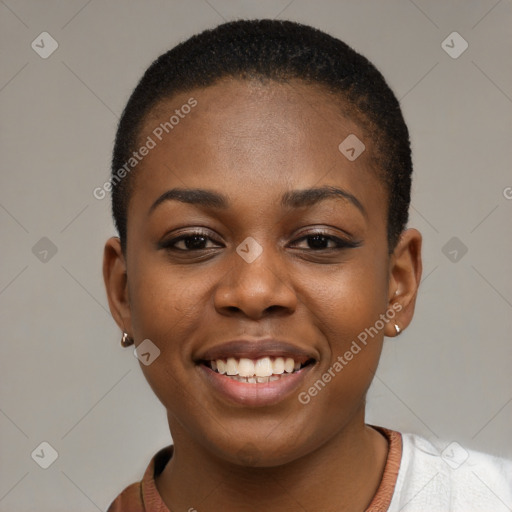 Joyful black young-adult female with short  brown hair and brown eyes