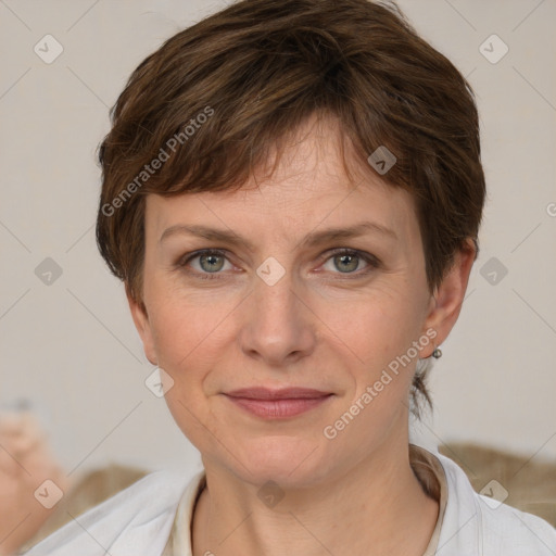 Joyful white adult female with short  brown hair and grey eyes