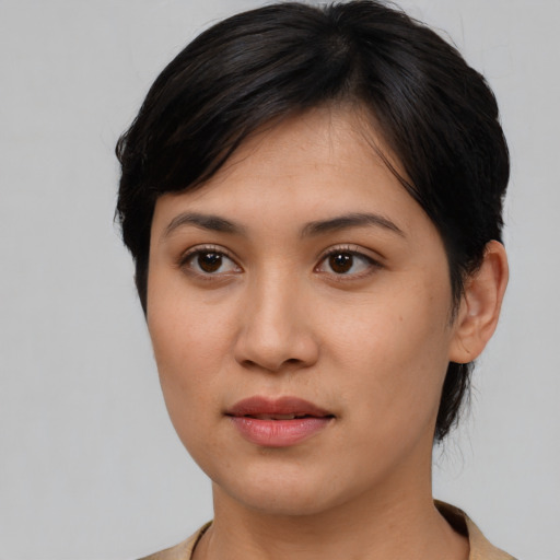 Neutral asian young-adult female with medium  brown hair and brown eyes