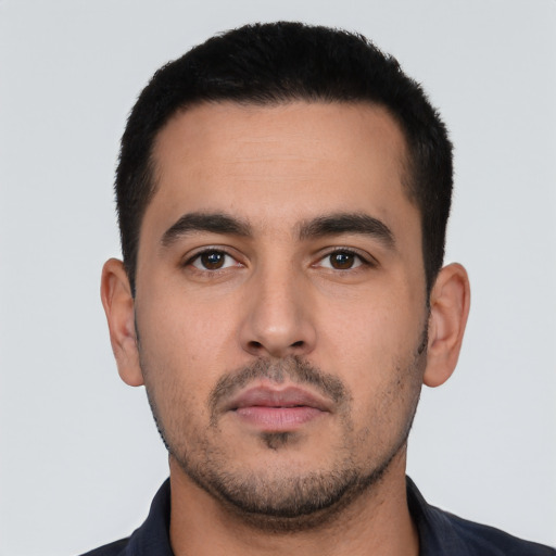Neutral white young-adult male with short  black hair and brown eyes