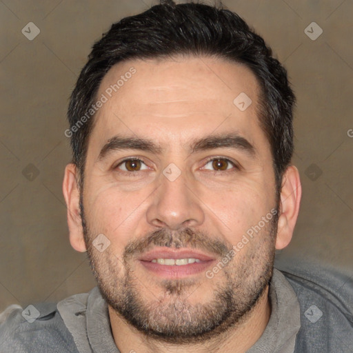 Joyful white adult male with short  brown hair and brown eyes