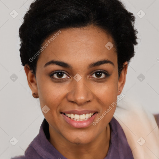 Joyful latino young-adult female with short  black hair and brown eyes