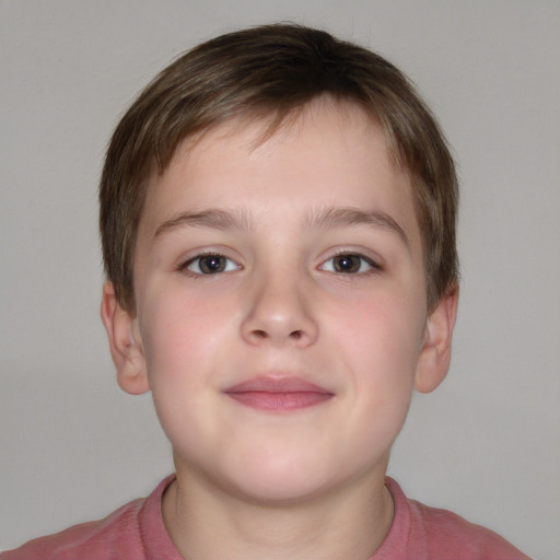 Joyful white child male with short  brown hair and grey eyes