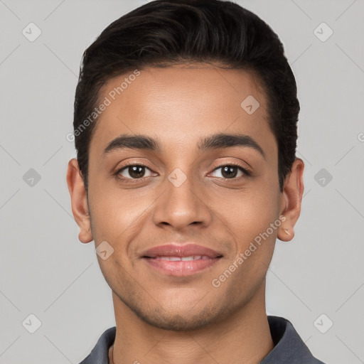 Joyful white young-adult male with short  black hair and brown eyes