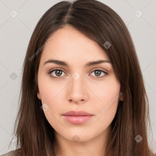 Neutral white young-adult female with long  brown hair and brown eyes