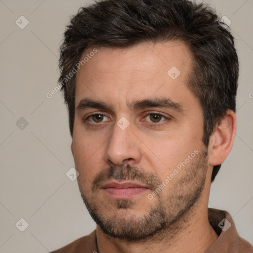 Neutral white adult male with short  brown hair and brown eyes