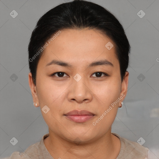 Joyful asian young-adult female with short  black hair and brown eyes