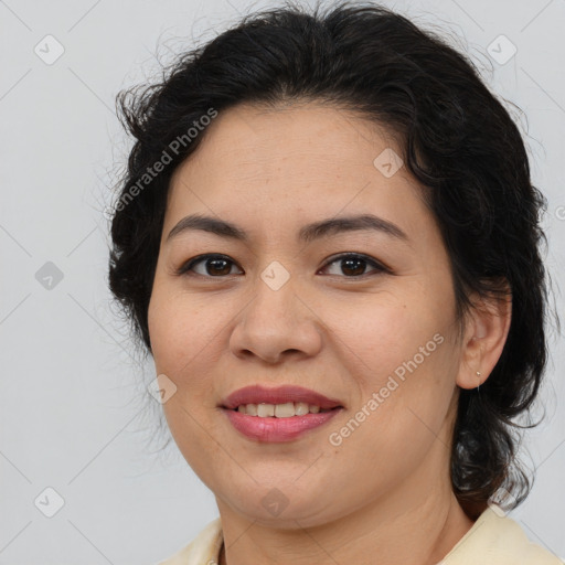 Joyful latino young-adult female with medium  brown hair and brown eyes