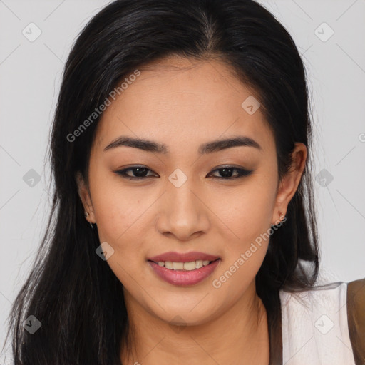 Joyful asian young-adult female with long  black hair and brown eyes