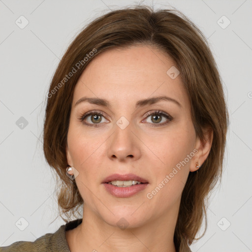 Joyful white young-adult female with medium  brown hair and green eyes