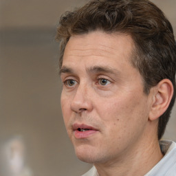 Neutral white adult male with short  brown hair and brown eyes