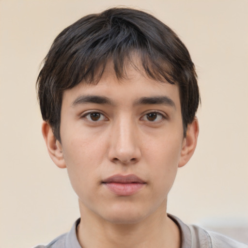 Neutral white young-adult male with short  black hair and brown eyes