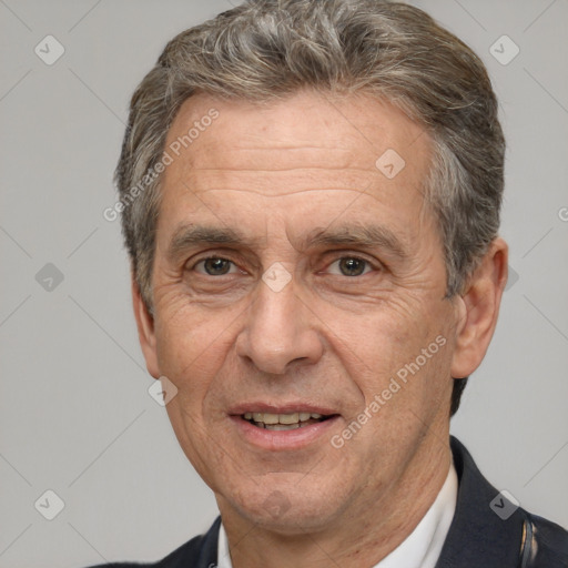 Joyful white middle-aged male with short  brown hair and brown eyes