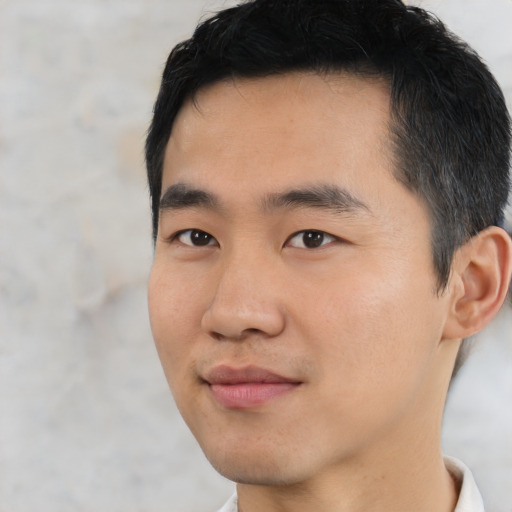 Neutral asian young-adult male with short  black hair and brown eyes