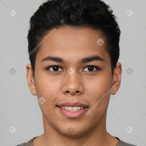 Joyful latino young-adult male with short  black hair and brown eyes