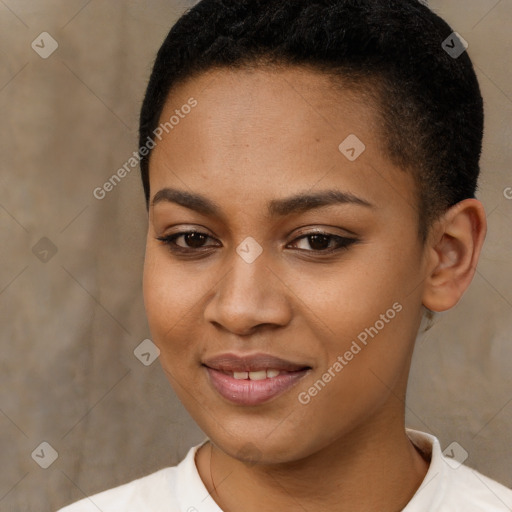 Joyful black young-adult female with short  brown hair and brown eyes