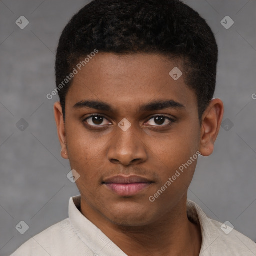 Joyful latino young-adult male with short  brown hair and brown eyes