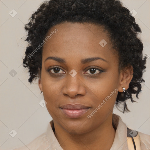 Joyful black young-adult female with medium  black hair and brown eyes