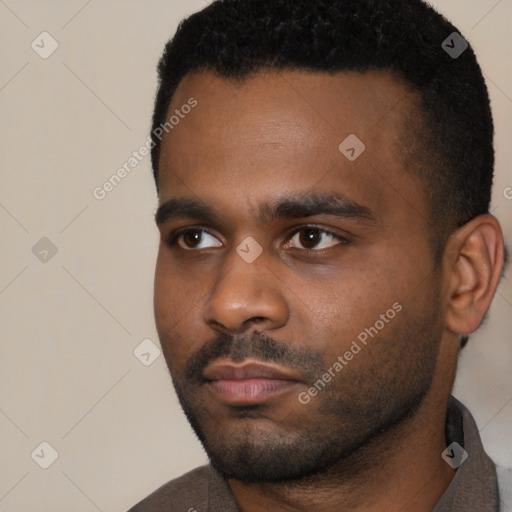 Neutral black young-adult male with short  black hair and brown eyes