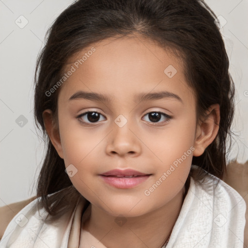 Joyful white child female with medium  brown hair and brown eyes