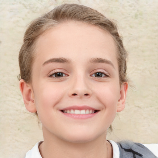 Joyful white child female with medium  brown hair and brown eyes