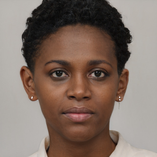 Neutral black young-adult female with short  brown hair and brown eyes