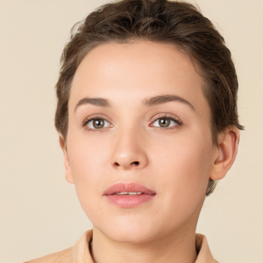 Neutral white young-adult female with short  brown hair and brown eyes