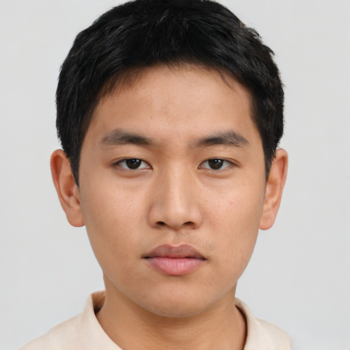 Neutral asian young-adult male with short  brown hair and brown eyes